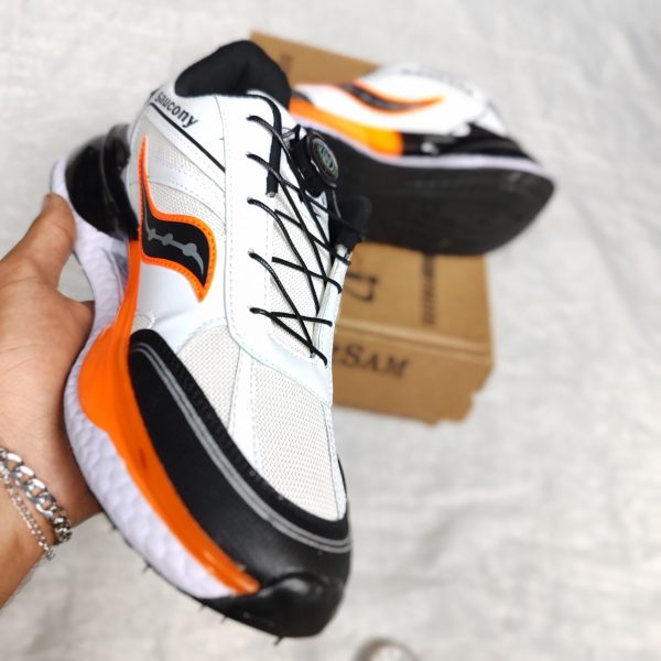 کتانی saucony اورجینال – رنگ سفید نارنجی